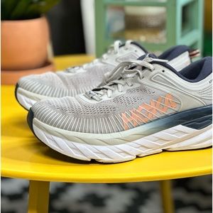 Gently used women’s  Hokas size 8.5. Grayand blue with peach color lettering.